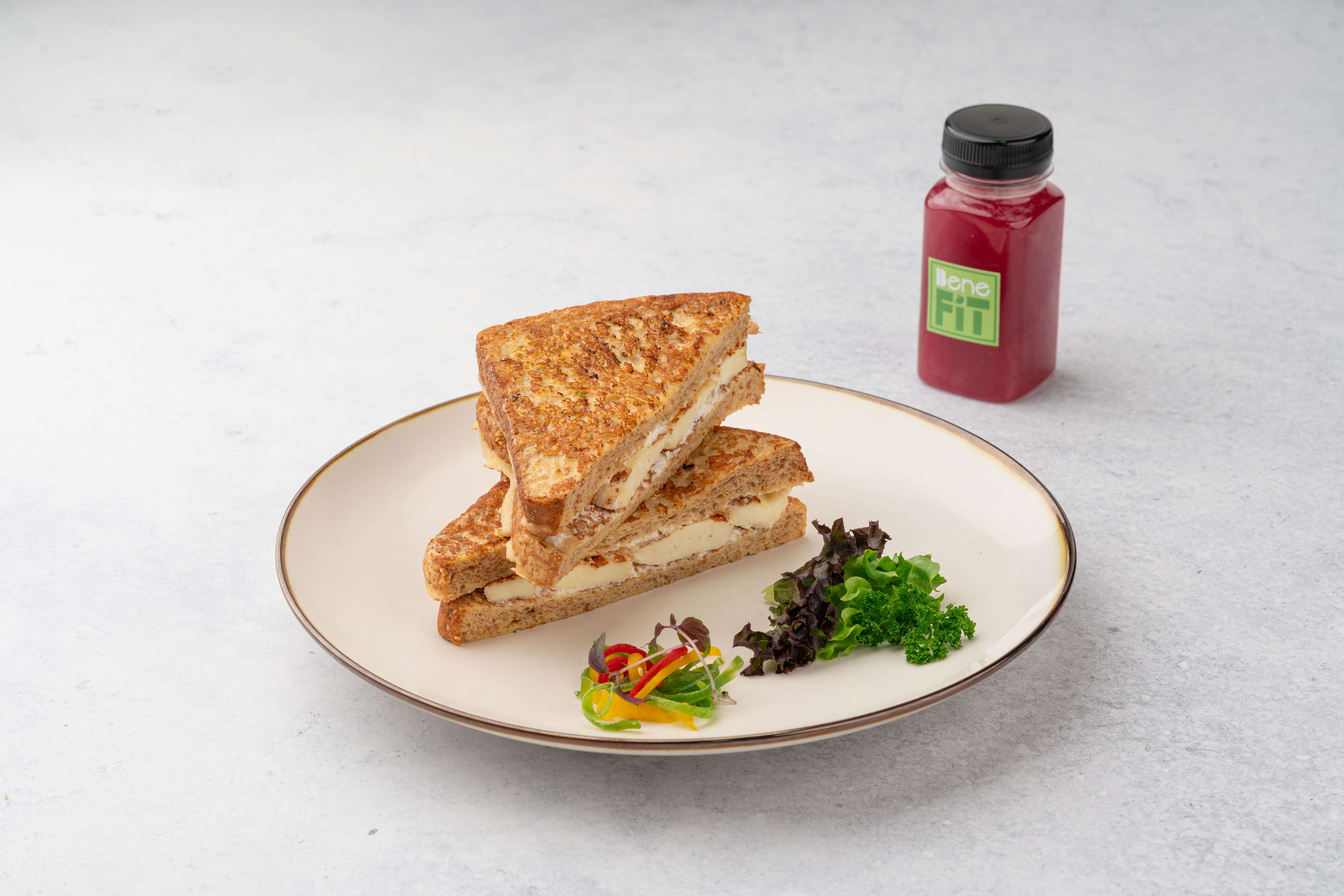 Halloumi & Hot Honey French Toast Served With Pomegranate Juice